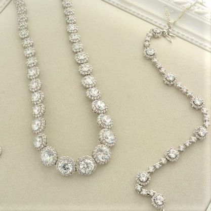 FOTO GARGANTILLA Y PULSERA EN ORO BLANCO Y BRILLANTES